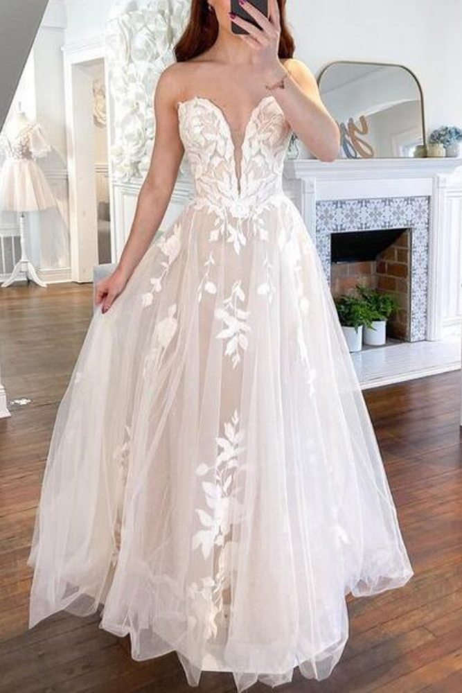 Ivory Strapless Plunging Neck A-Line Wedding Dress Movousdress Ivory Strapless Plunging Neck A-Line Wedding Dress Movousdress